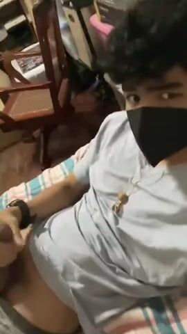 See why masked cam boy strokes his hard cock