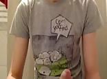 Redhead hunk strokes cock in bathroom