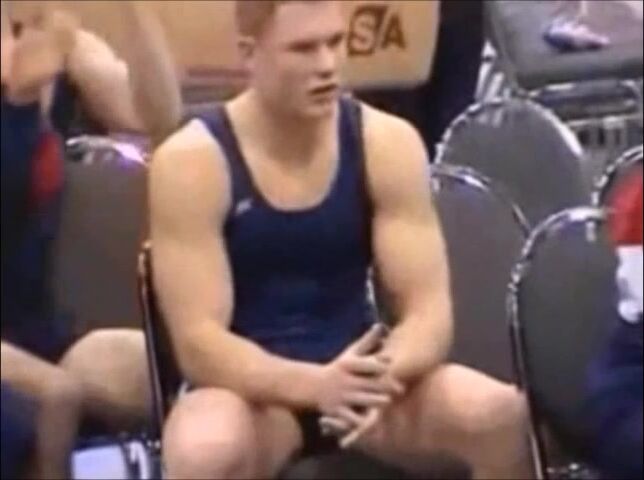 Spy catches blonde stud’s bulging wrestler cock