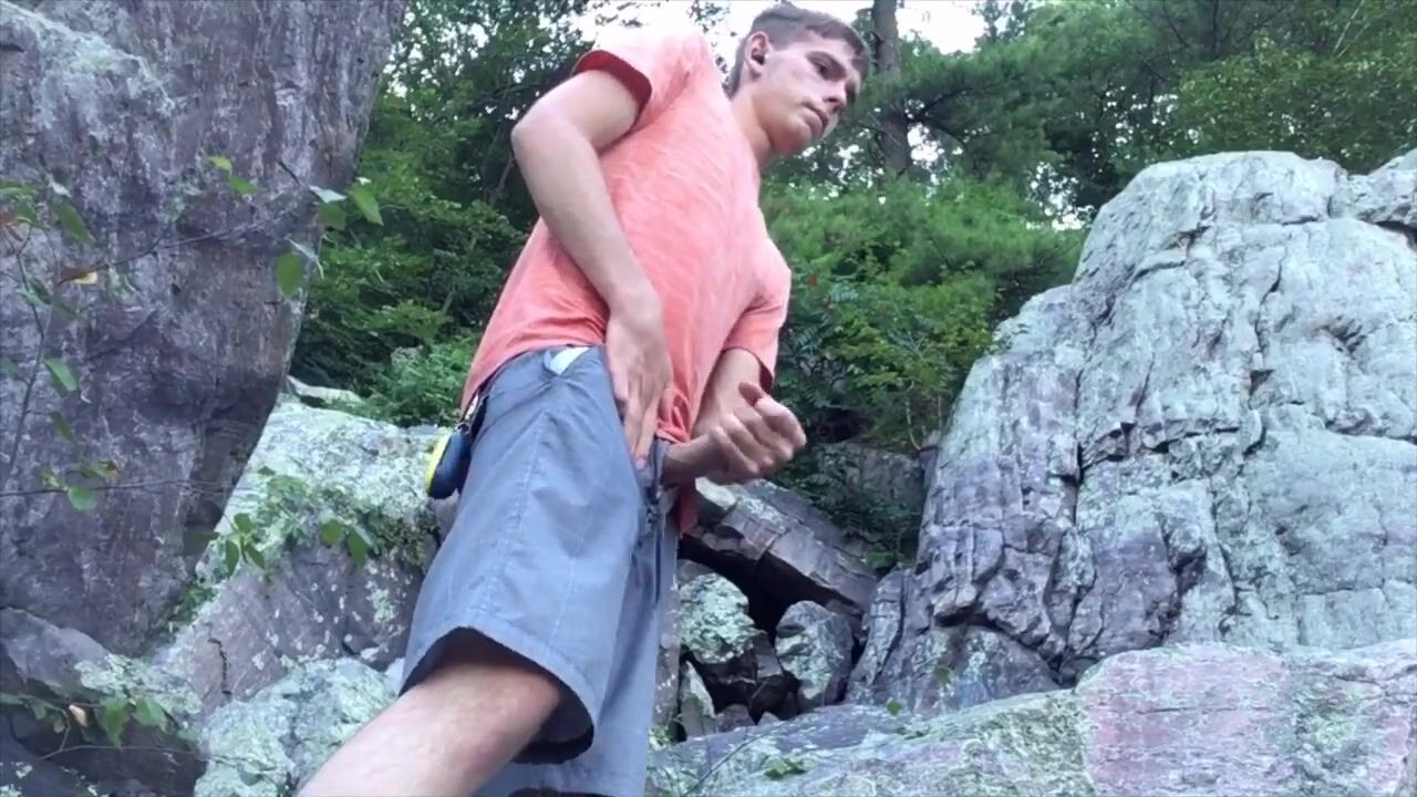 Young stud jerks off in public
