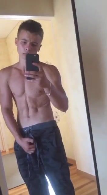 Muscle boy bares his cock shirtless