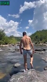 Twink shows hard boner by the river