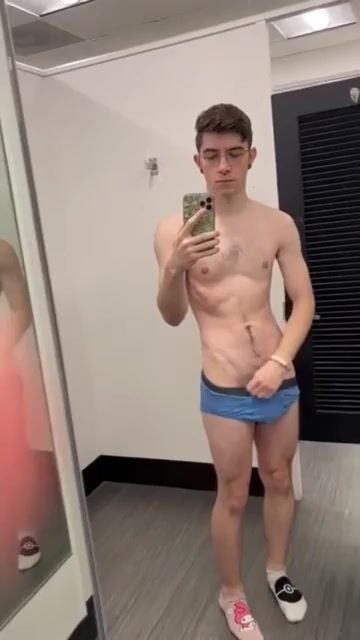 Shy boy wanks in a dressing room gay porn