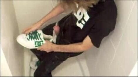 Skater twink jerks cock in shower