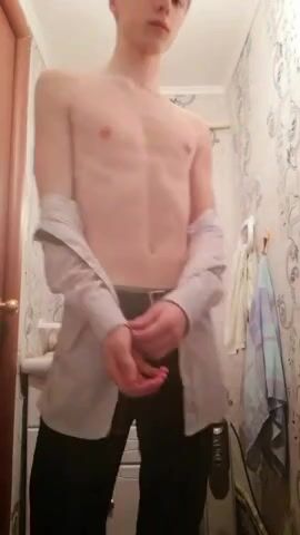 Skinny boy undresses
