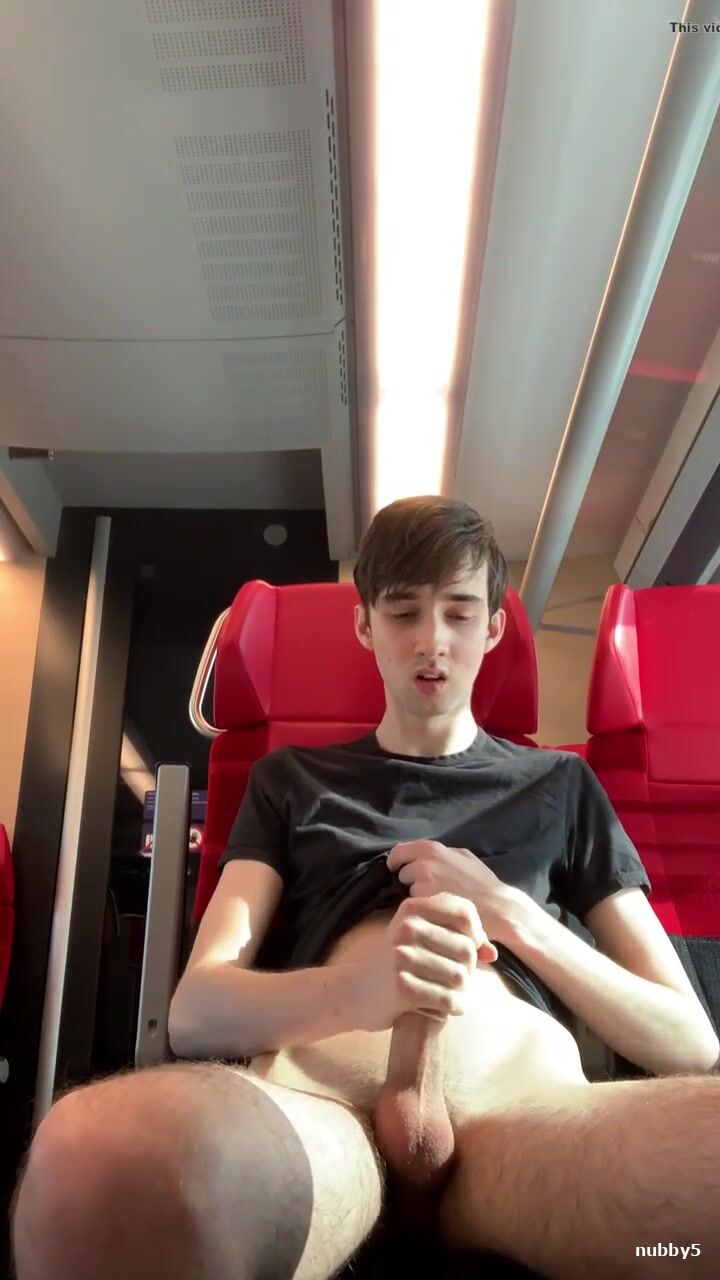 Skinny twink busts a nut on the train