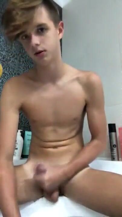 Slim blond boy cums hard in hot show
