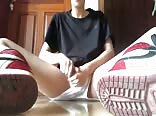 Sneaker boy pisses hard in gay tube action