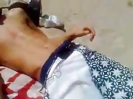 Spanish boy have fun on the beach