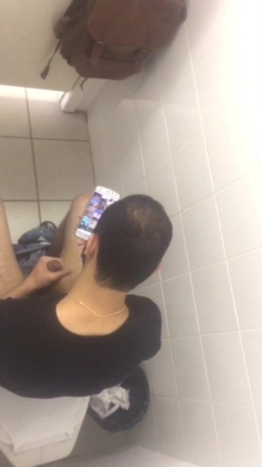 Giant cock guy caught jerking off in toilet