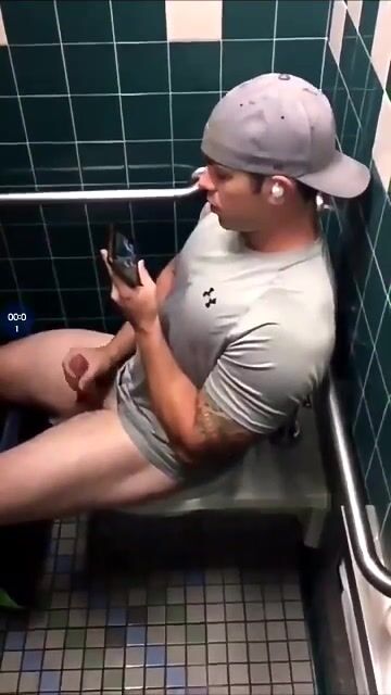Spying on a twink in the toilet cam boys porn