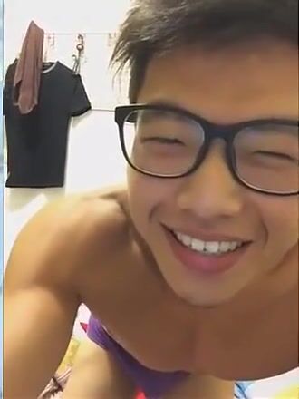 Chinese muscle hunk in glasses jerks and cums