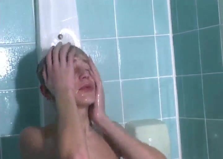 Sweet blonde takes a shower and suddenly gets horny