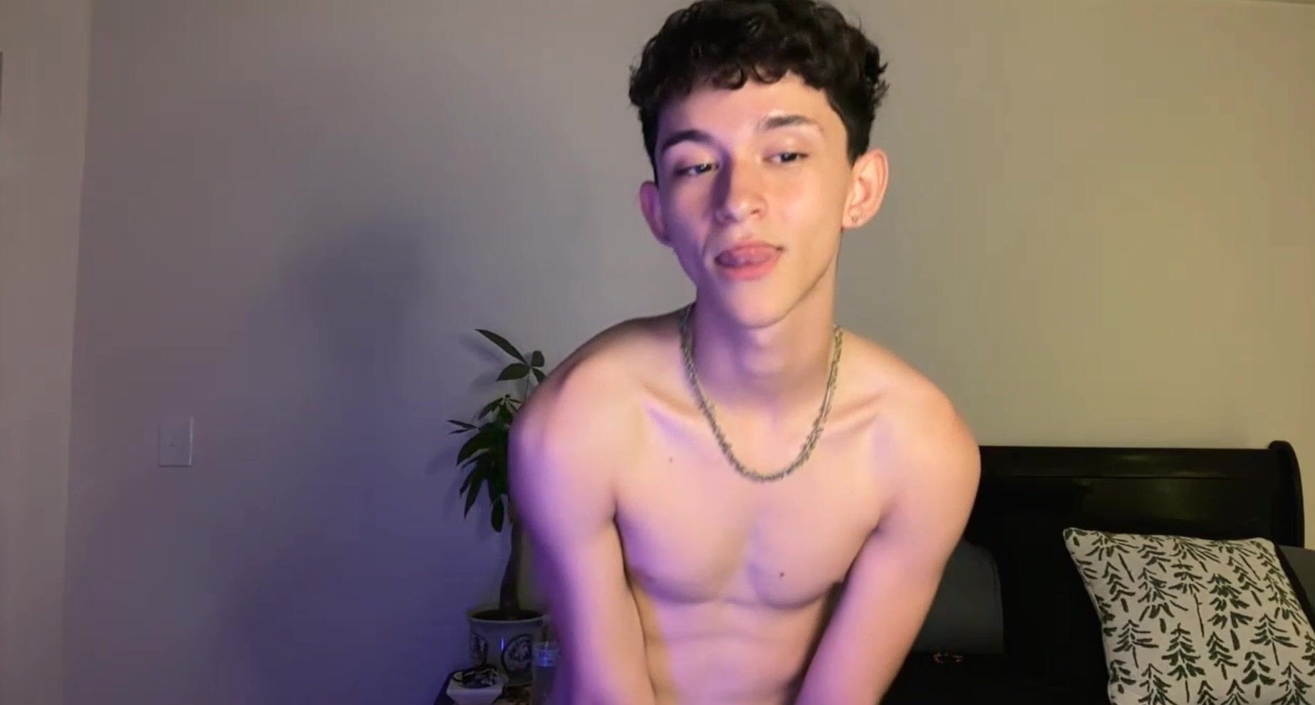 Twink strips naked and jerks his cock