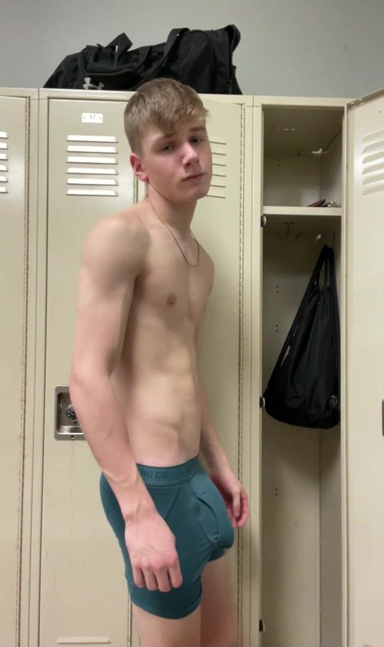 Paul undresses in locker room swimmer