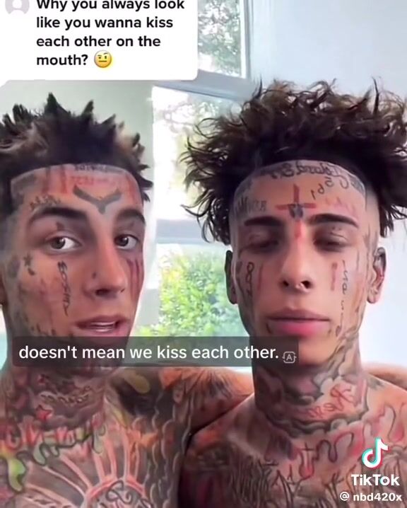 Tattooed twin twinks share raw cock