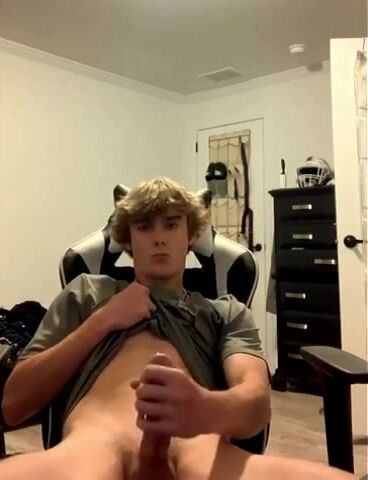 Teen gamer jerks off in chair