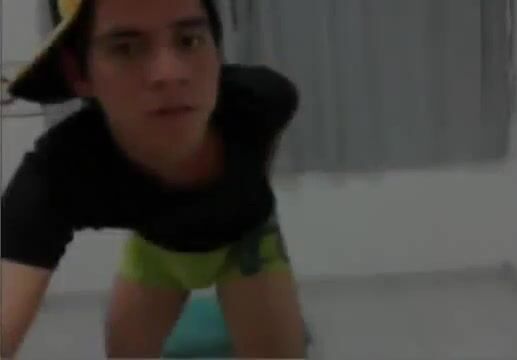 Teen boy strips in his room
