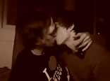 Teen boys kissing passionately