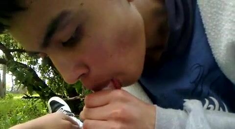 Teen sucks friend cock outdoor