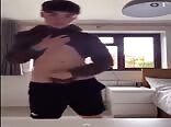 Teen stands up to stroke his cock
