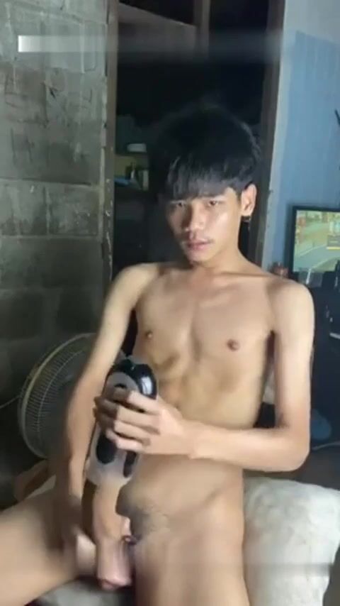 Thai boy uses his toy to cum