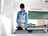 Asian twink jerks tight foreskin cock in empty college classroom