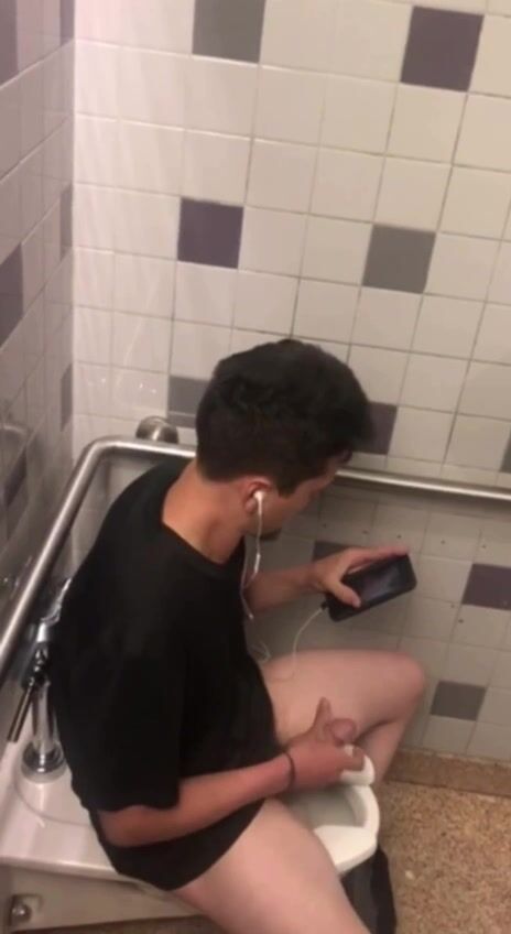 Spy catches twink jerking off