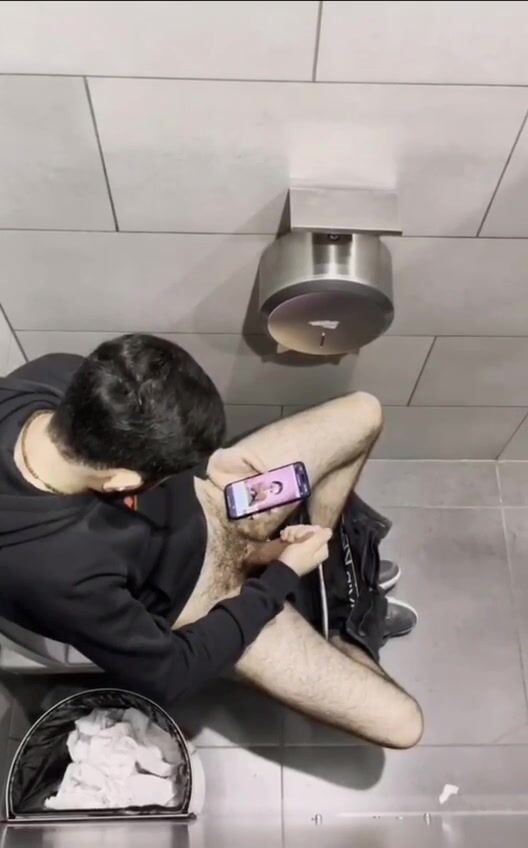 Spy catches twink jerking off