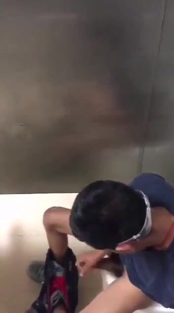 Spy catches twink jerking in toilet