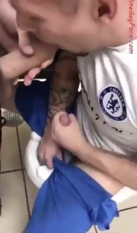 Twink sucks stranger’s cock in public toilet till he cums