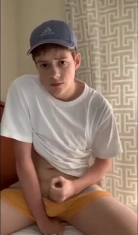 Twink jerks and cums in shorts