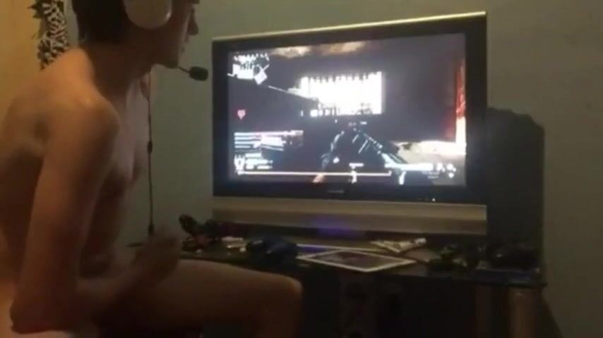 Twink jerks off while gaming