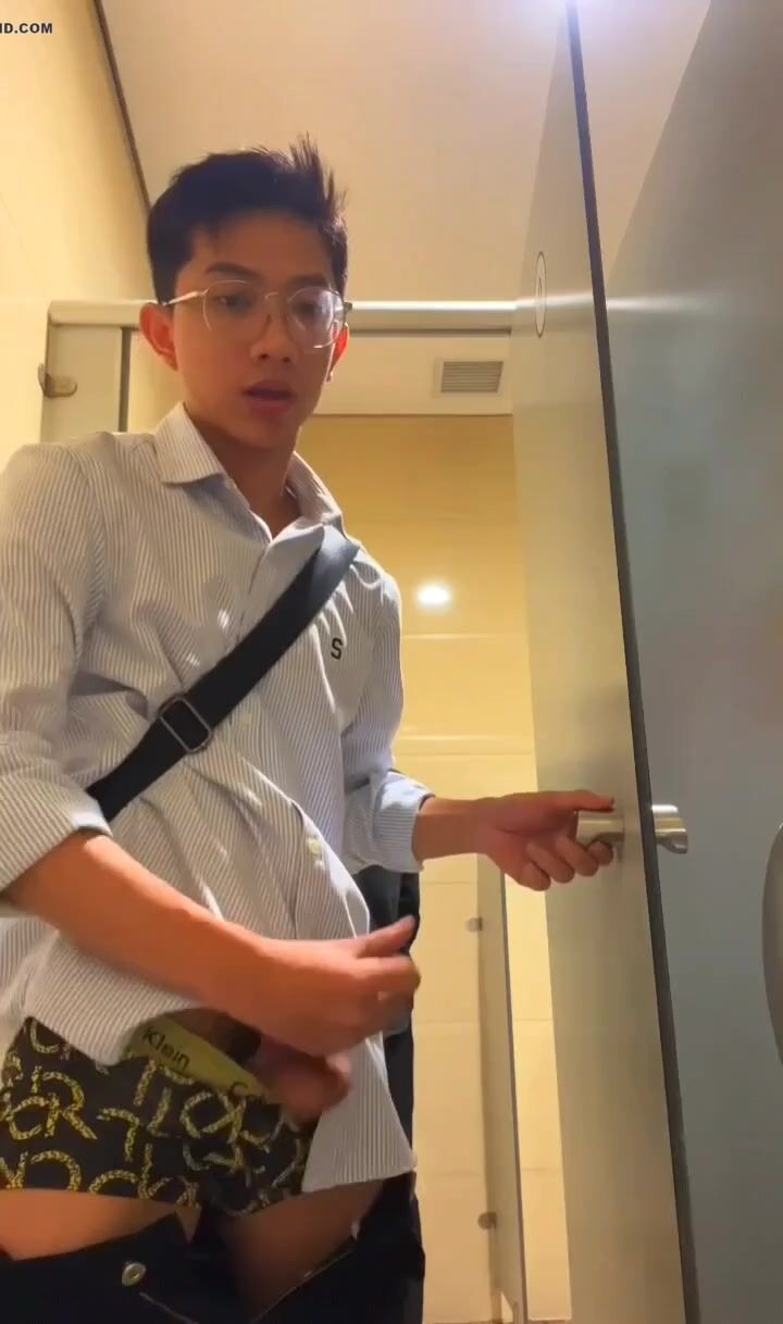 Twink sprays cum in cubicle handjob