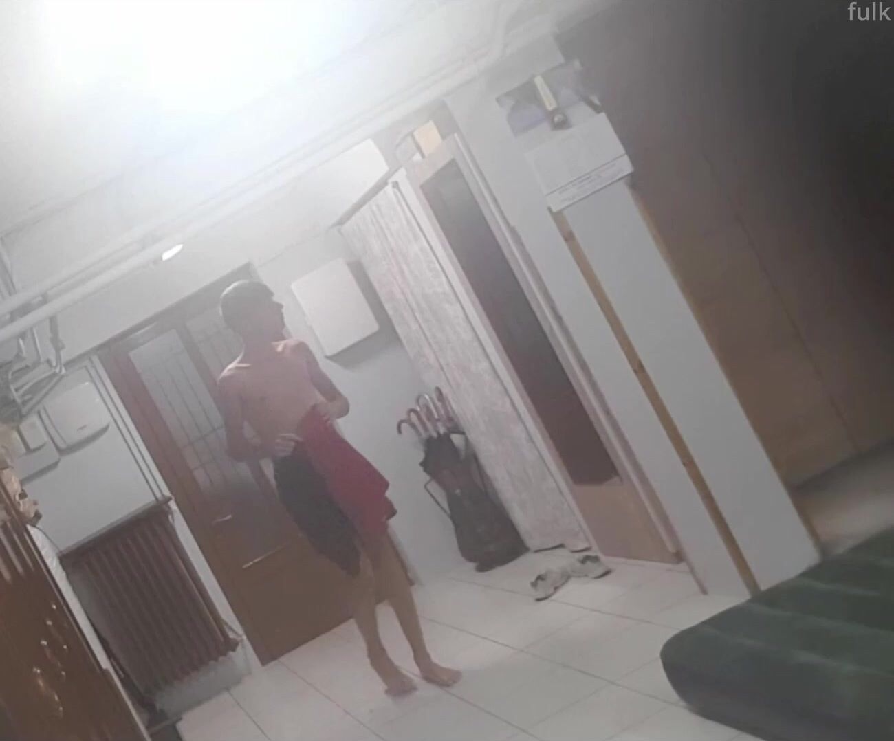 Sporty voyeur boy changes his shorts