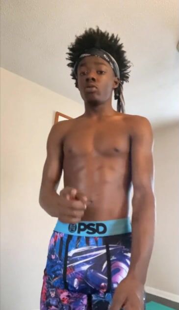 Black boy tries yoga stretches