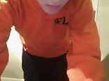 Young and cute wanker with his orange sweatshirt