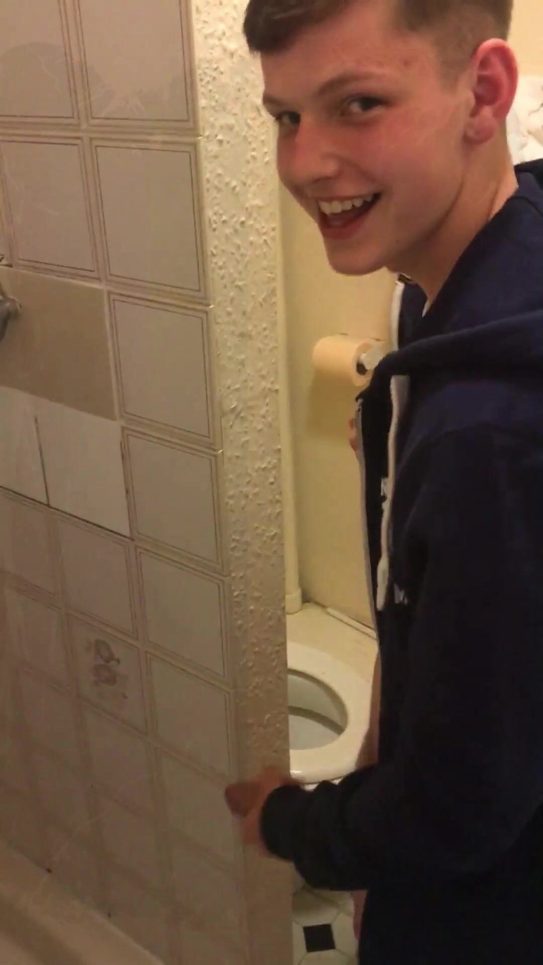Young twink pisses and jerks in shower