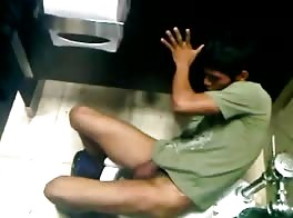 Young wanking him in public toilets