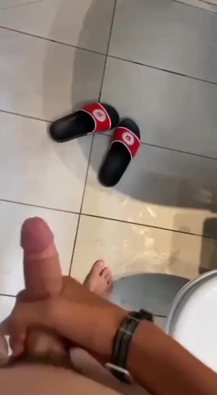 Yummy dude jerks off in bathroom